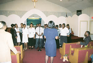 The True United Choir ministers with song