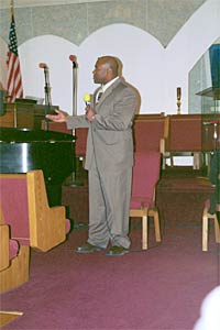 Elder Rufus Peterson in the play